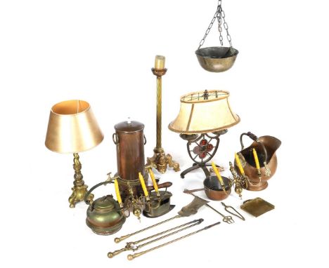 Lot of various copperware including double tap jug, 56 cm high, candlestick helmet kit and a table lamp on wrought iron base,