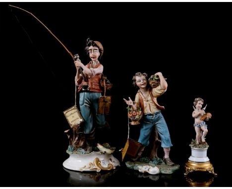 3 biscuit porcelain statues of a fisherman, boy with vegetable baskets and putto, marked Capodimonte, 19 cm, 25.5 cm and 46 c