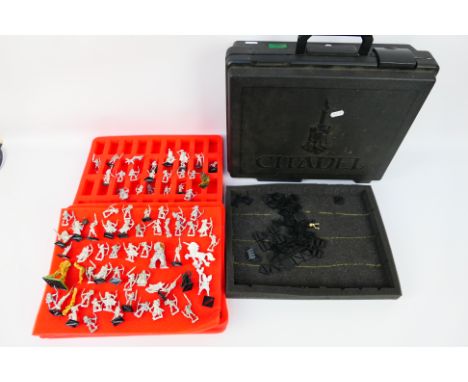 Warhammer - Games Workshop - Citadel - A black Citadel carry case containing approximately 69 largely unpainted Warhammer Woo
