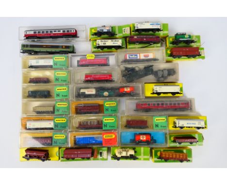 Minitrix - Arnold Rapido - Lima - A collection of mostly boxed N gauge rolling stock including Ford Bogie Covered wagon # N50