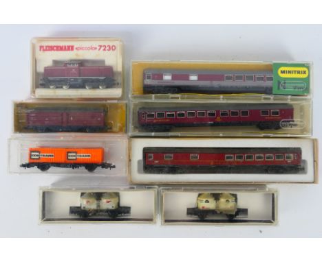 Fleischmann - Minitrix - Arnold Rapido - A group of N gauge models, a V100 Diesel locomotive with a collection of rolling sto