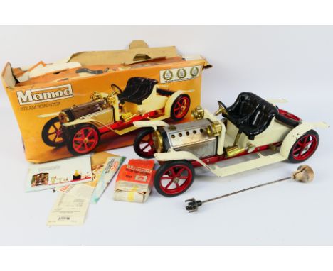 Mamod - A boxed Mamod SA1 Steam Roadster. The live steam engine shows signs of use, with some rust marks and chipping to body