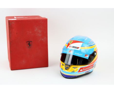 Ferrari - Fernando Alonso 2012 miniature scale replica race helmet, with original Ferrari branded presentation box..   