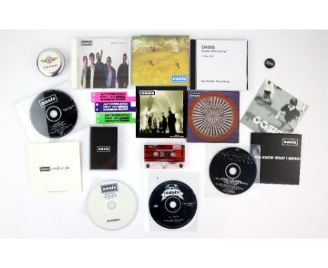 Oasis - 12 different promo singles and samplers including ‘Don’t Go Away’ US promo CD, ‘Be Here Now’ promo CD 'Stop The Clock