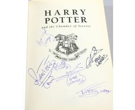 Harry Potter and the Chamber of Secrets - Paperback book, signed to inside page by cast including Rupert Grint, Tom Felton, J