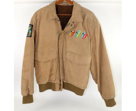 Rolling Stones Steel Wheels Crew Tour Jacket (1989). Heavy tan leather outer with aircraft inner motif, Colourful embroidered