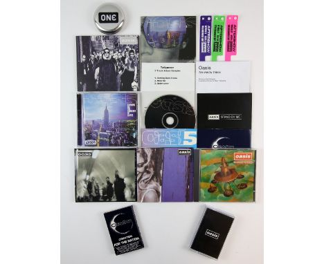 Oasis - 12 different promo singles samplers and albums including ‘All Around The World’ US promo CD, 'Heathen Chemistry' albu