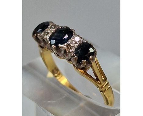 Diamond and sapphire ring. 3.3g approx. Size K. (B.P. 21% + VAT)diamonds are intact 