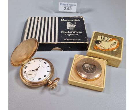 Dominant gold-plated full hunter keyless pocket watch with Arabic face having seconds dial together with a DQ powder compact 