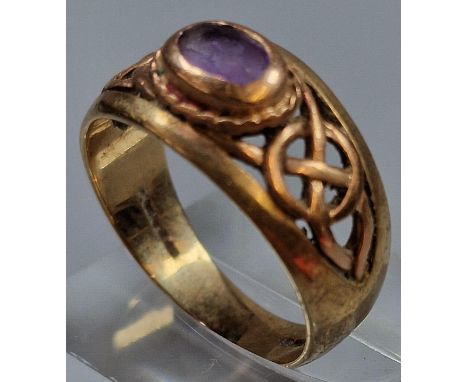 Clogau Celtic gold and amethyst ring. 6g approx. Size S.  Possibly 14ct. Hallmarks very grubby and illegible.  (B.P. 21% + VA