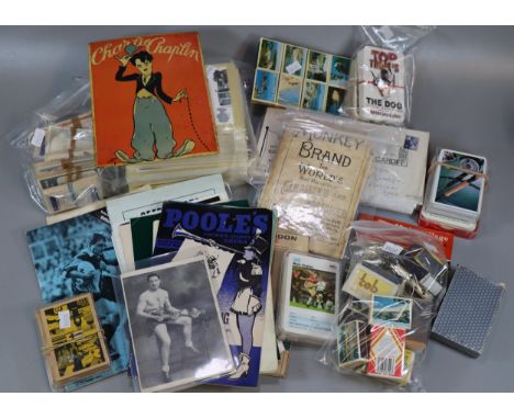 Collection of ephemera to include: tin Charlie Chaplin sign, various playing cards, matchboxes, cigarette cards, football and