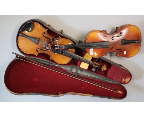 Two student-type violins labelled as Stradivarius copies one with bow in fitted case. (2) (B.P. 21% + VAT) Believed to be ful