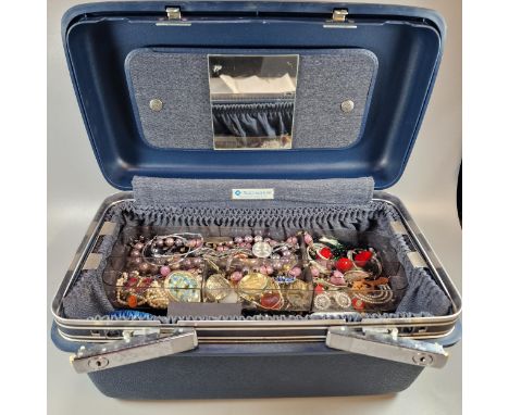 Vanity case comprising vintage and other jewellery: brooches, Celtic designs, necklaces, bracelets, watches, earrings, pendan