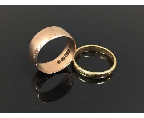 A 9ct gold band ring, 2.9g, size K, together with another yellow metal band ring. (2) CONDITION REPORT: The unmarked yellow m