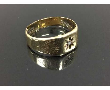 A 9ct gold  Gentleman's ring set with a small diamond, 3.6g, size S. CONDITION REPORT: Good condition.