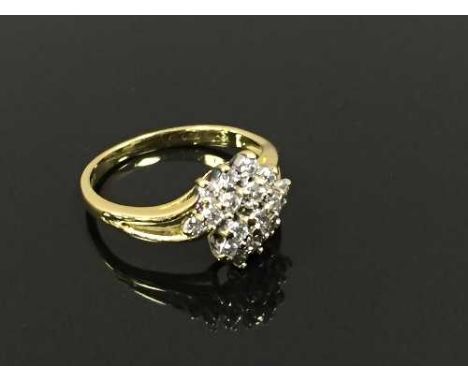 An 18ct gold diamond cluster ring, size K. CONDITION REPORT: Good conditions.