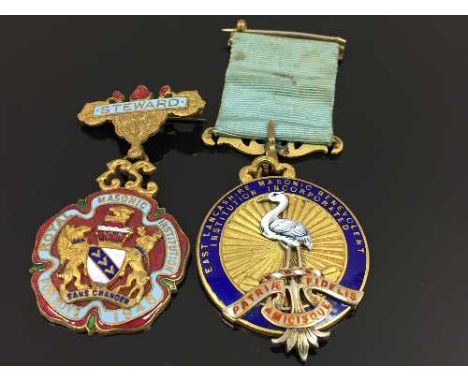 Two gilt metal and enamel masonic medals, together with apron collar. CONDITION REPORT: Good conditions, medals for East Lanc