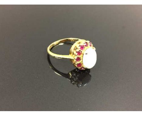 An 18ct gold opal cluster ring, size N/O. CONDITION REPORT: Good condition.