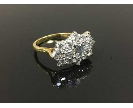 An 18ct gold diamond dress ring set with baguette and round cut diamonds, approximately 2.4ct, size R/S. CONDITION REPORT: Go