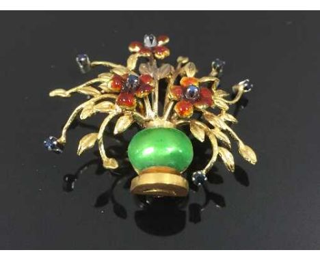 An 18ct gold enamel and sapphire brooch set as a vase of flowers, 8.5g. CONDITION REPORT: Good condition, approximately 35mm 