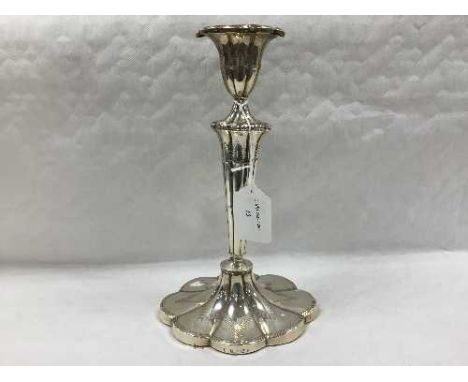 A nineteenth century silver candlestick, indistinct hallmark, 26.5 cm, 618.4g. CONDITION REPORT: Gross weight with loaded bas