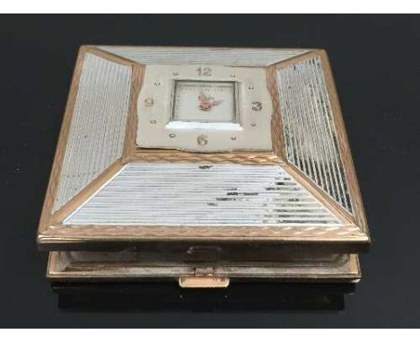 A vintage Buler 15 jewels clock compact, 7.5 cm x 7.5 cm. CONDITION REPORT: Good condition, gilt metal with some tarnishings,