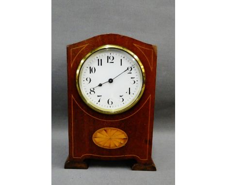 Mahogany and inlaid mantle clock, the arched top over a circular dial with Roman numerals, 20cm 