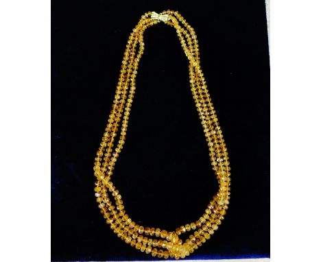 Topaz multi strand necklace with 14 carat gold bow clasp fitting, retailed by Joseph Bonnar, Edinburgh