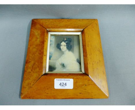 Burrwood frame containing a portrait miniature print of a young lady, size overall 18 x 20cm 