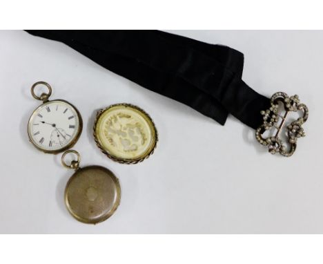 Silver and ivory pendant, paste set silver buckle and two white metal cased pocket watches (4) 