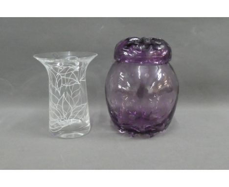 Amethyst coloured art glass jar and cover together with an art glass vase, (2)