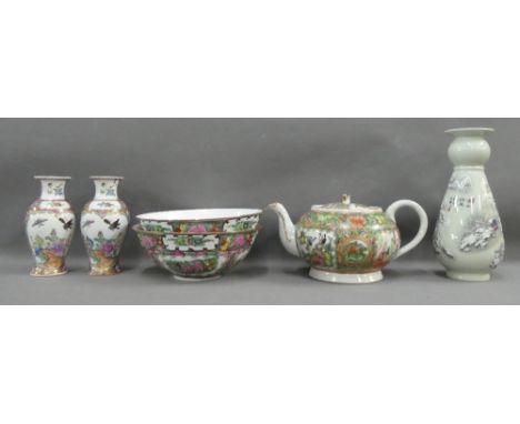 Collection of Chinese and Japanese porcelains to include a Famille Rose teapot, two bowls and three vases etc., (a lot) 