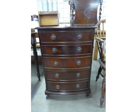 A mahogany bow front chest of drawers