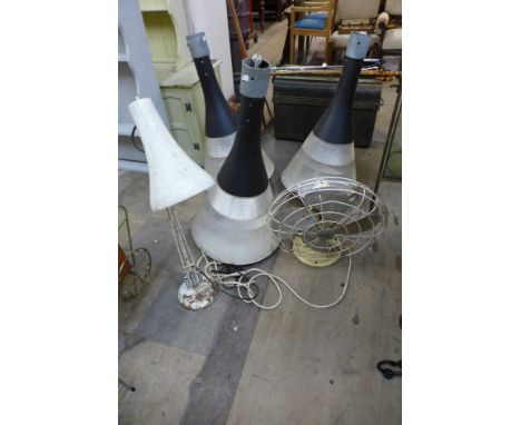 A set of three perspex hanging lights, an anglepoise desk lamp and a vintage fan by Verity's Fans Ltd.