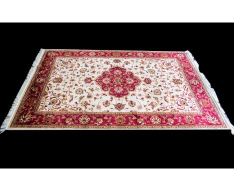  Woven Silk Carpet Keshan rug with beige ground and traditional Middle Eastern floral and foliate border detail with central 