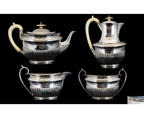 Walker And Hall Victorian Period Attractive Solid Silver Four Piece Tea And Coffee Service With fluted half body, gilt interi