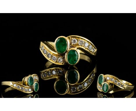 Ladies - Attractive 18ct Gold Emerald and Diamond Set Dress Ring ( Snake Eye ) Design, The Central Two Oval Shaped Emeralds o