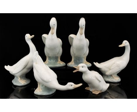 Nao A Collection Of Six Duck Figures Each in varying pose, each marked to base. The tallest, 6 inches, smallest 3.5 inches. P