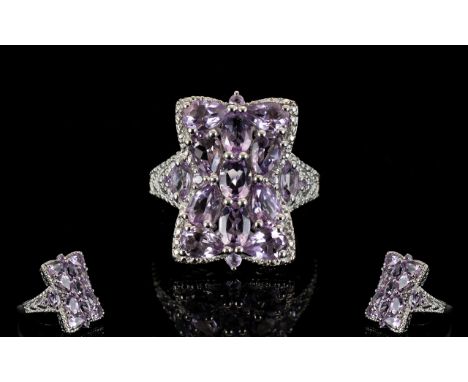 Rose de France Amethyst Rectangular Cluster Ring, a slightly shaped rectangular panel set with a cluster of 4.5cts of Rose de