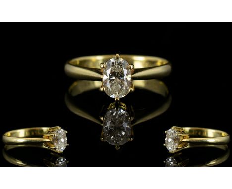 18ct Gold - Oval Cut Single Stone Set Diamond Ring, Marked 750-18ct. Top Quality Diamond. Est weight 0.50pts. Est colour F-G.