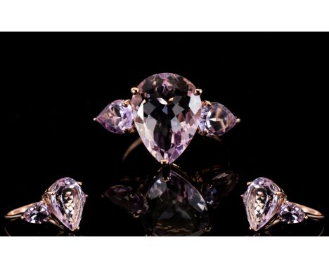 Rose de France Amethyst Pear Cut Ring, a 7.5ct pear cut, clear, sparkling Rose de France amethyst to the centre, flanked by a