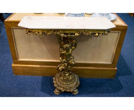 Reproduction Italian Style Figural Console Table Gilt support with putti figure and reconstituted marble top. Height, 31.5 in