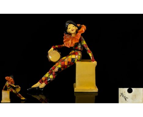 Wade - Art Deco Period Hand Painted Ceramic Figure of a Female Harlequin / Pierrette Called ' Anita ' Seated on a Plinth Hold