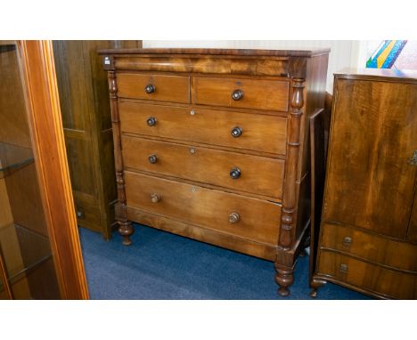Victorian Chest Of Drawers Frieze drawer above two short and three long graduating drawer. Raised on bobbin feet with turned 