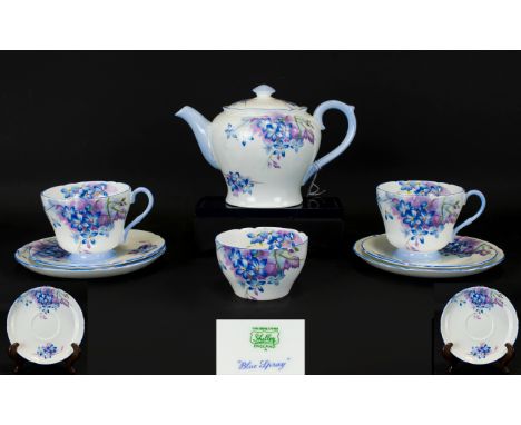 Shelley 'Blue Spray' Teaset comprising Teapot, Sugar Bowl, Two Cups and Saucers and Two Small Cake Plates.  Pretty bone china