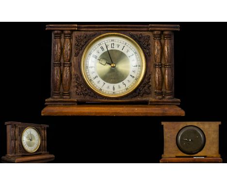 Westclox - Early 20th Century Carved and Wooden Cased Mantle Clock, In The Form of a Fire Surround, Features a Circular Dial,