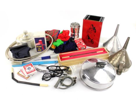 A Collection of Magicians props, to include two cake pans, two funnels, two pairs of comedy scissors, a pair of hand cuffs, v