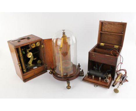 A 19th century brass monocular microscope by J. STEWARD LONDON, housed in a mahogany case with spare objectives, Case 25cm hi