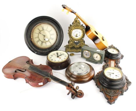 A large Victorian oak cased wheel barometer detailed W. HINTONS, 133cm high, two smaller Victorian wheel barometers, an eboni
