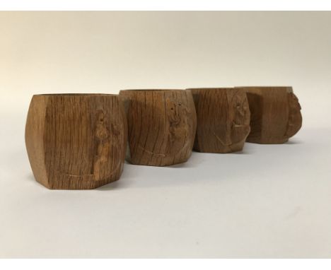 A set of four Robert Thompson of Kilburn Mouseman napkin rings